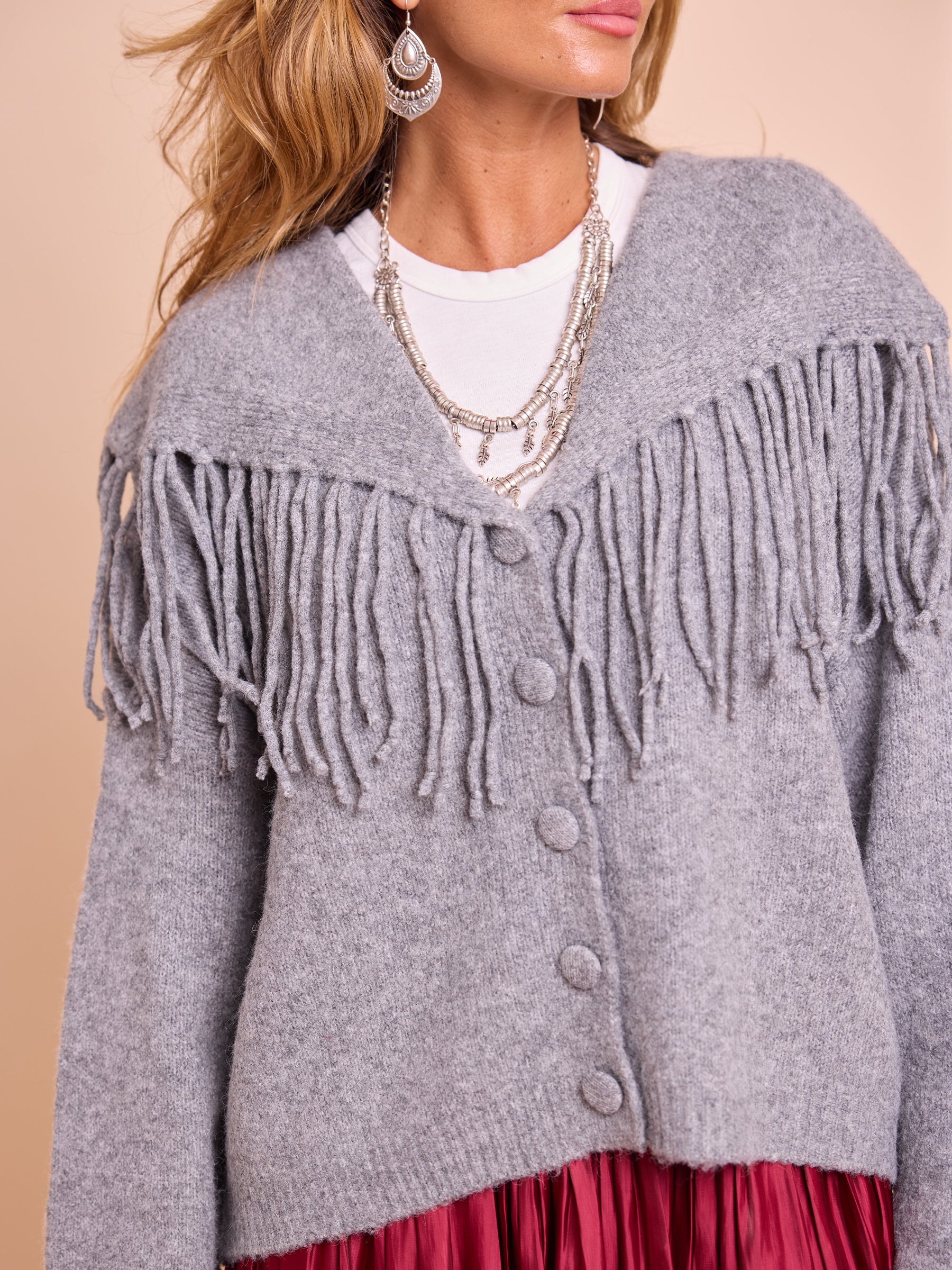 Casaco Malha Franjas