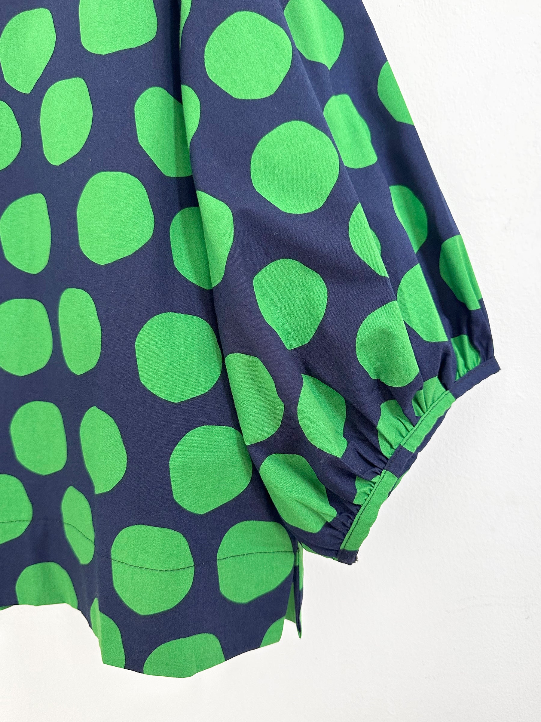 Blusa de bolas