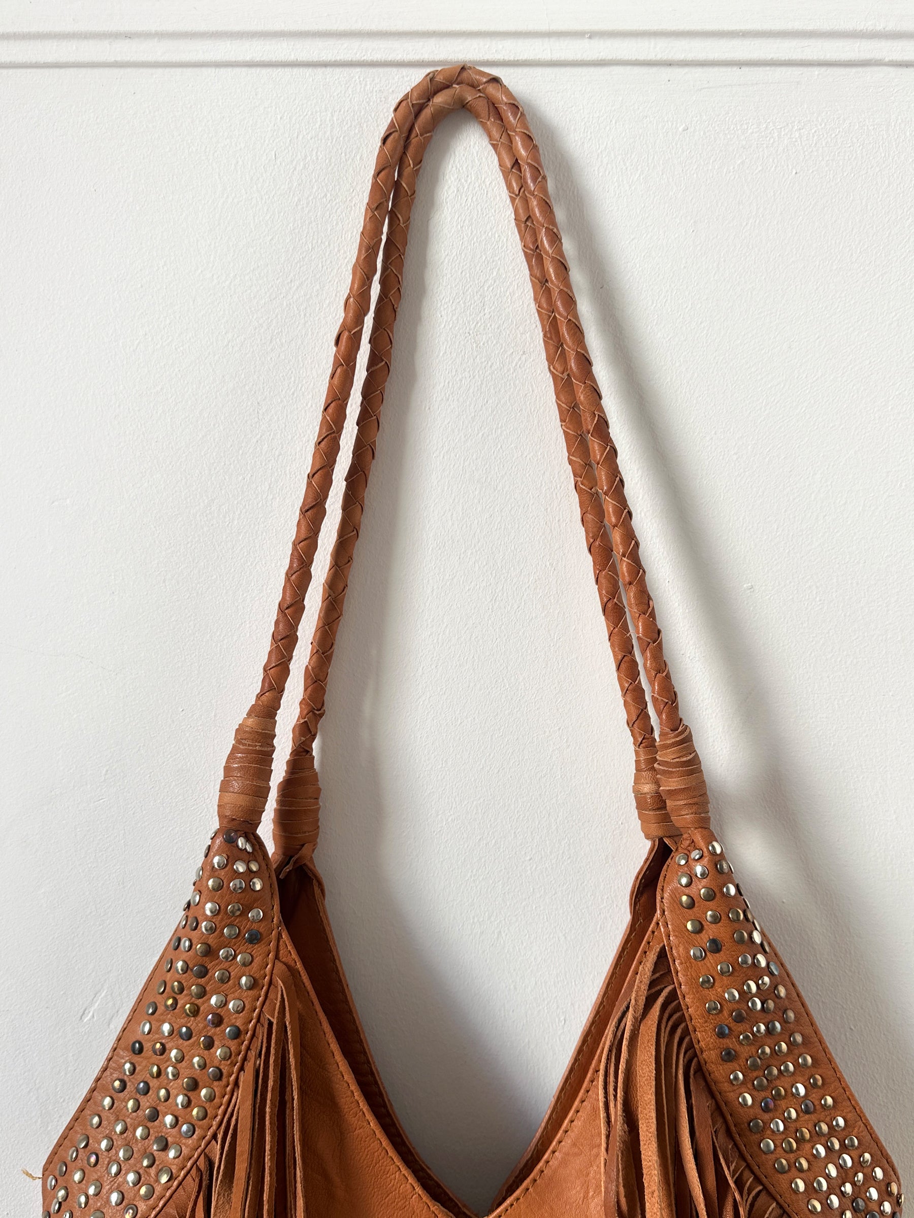 Bolso de piel con flecos